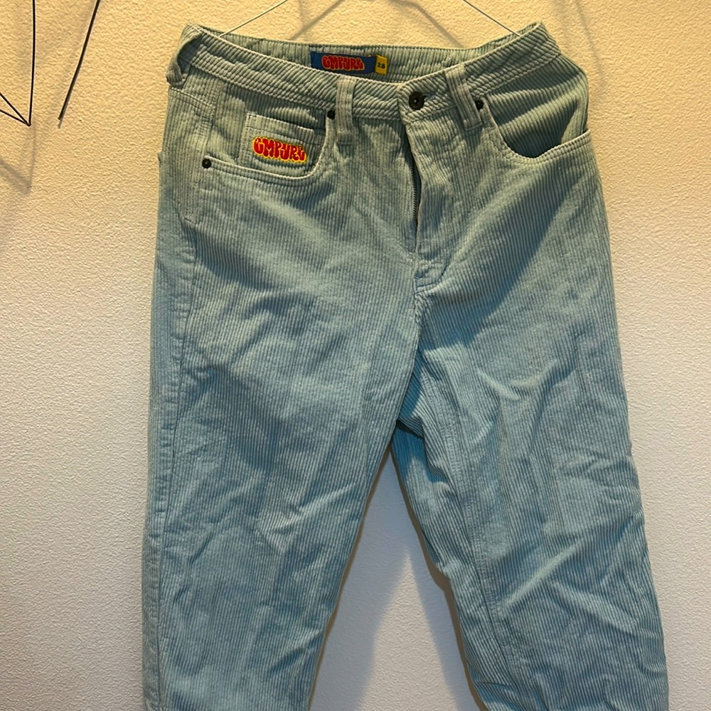 Teal blue corduroy pants. 
￼